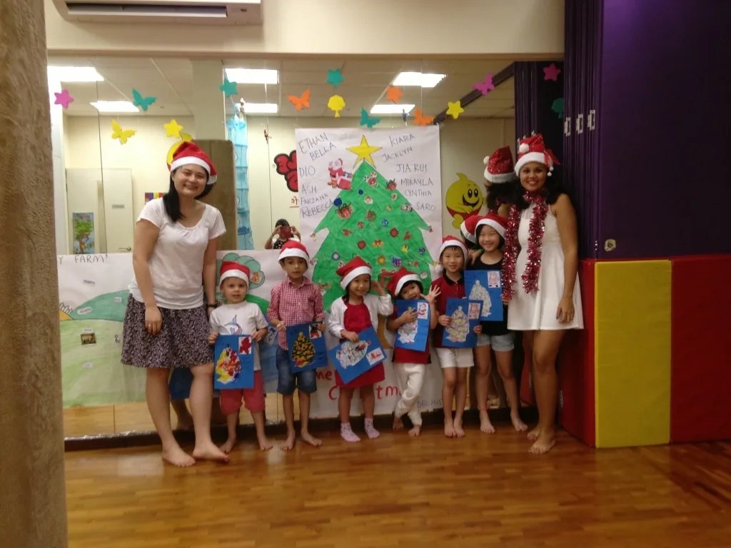 Young children enjoying a French playgroup activity